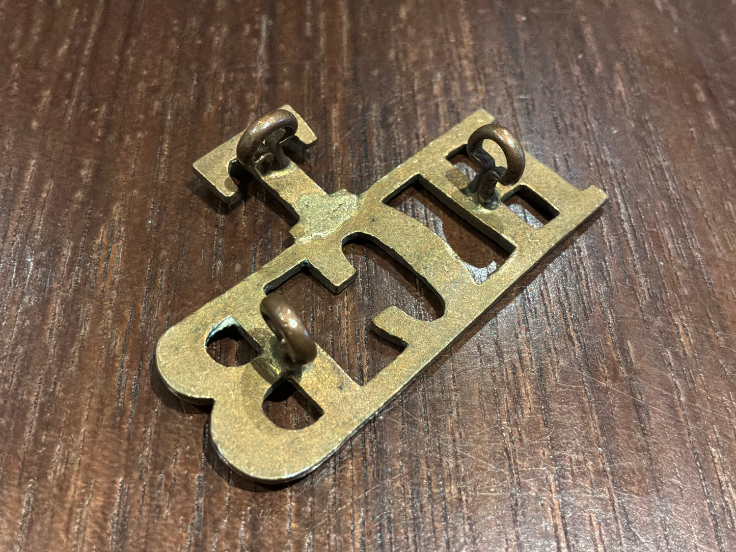 WW1 T/HCB brass title (Highland Cyclist Battalion)
