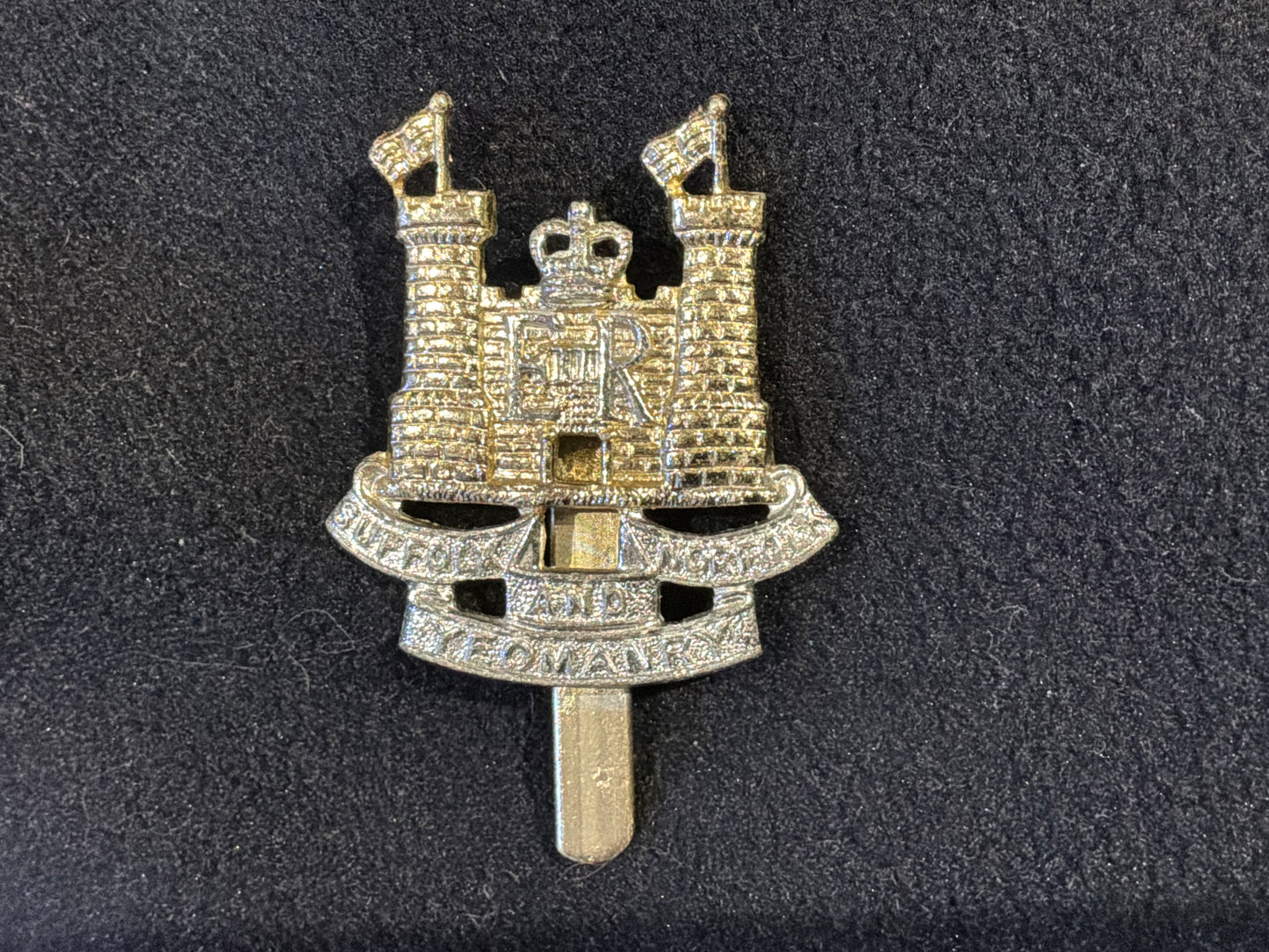 Anodised Suffolk and Norfolk Yeomanry cap badge by H.W TIMINGS LTD.