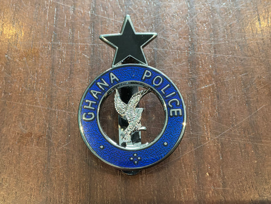 Ghana Police coloured enamel cap badge.