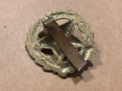 WW2 Indian Army Engineers cap badge.