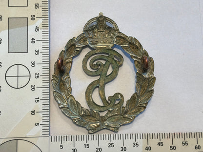 Post 1902 Seychelles Police cap badge.