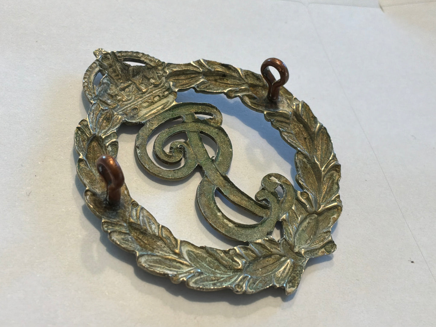 Post 1902 Seychelles Police cap badge.