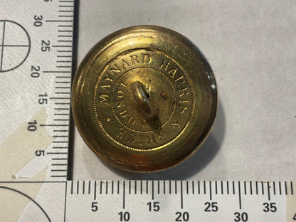 Q.V.C North West Mounted Police (NWMP) button with die error.