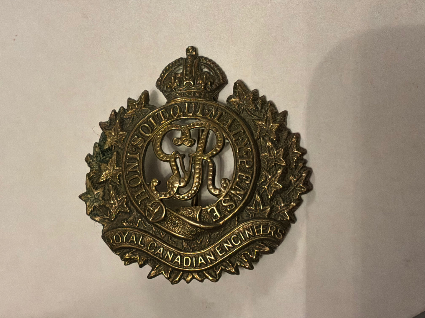 WW1 CEF Royal Canadian Engineers cap badge with rear pugri fixing.