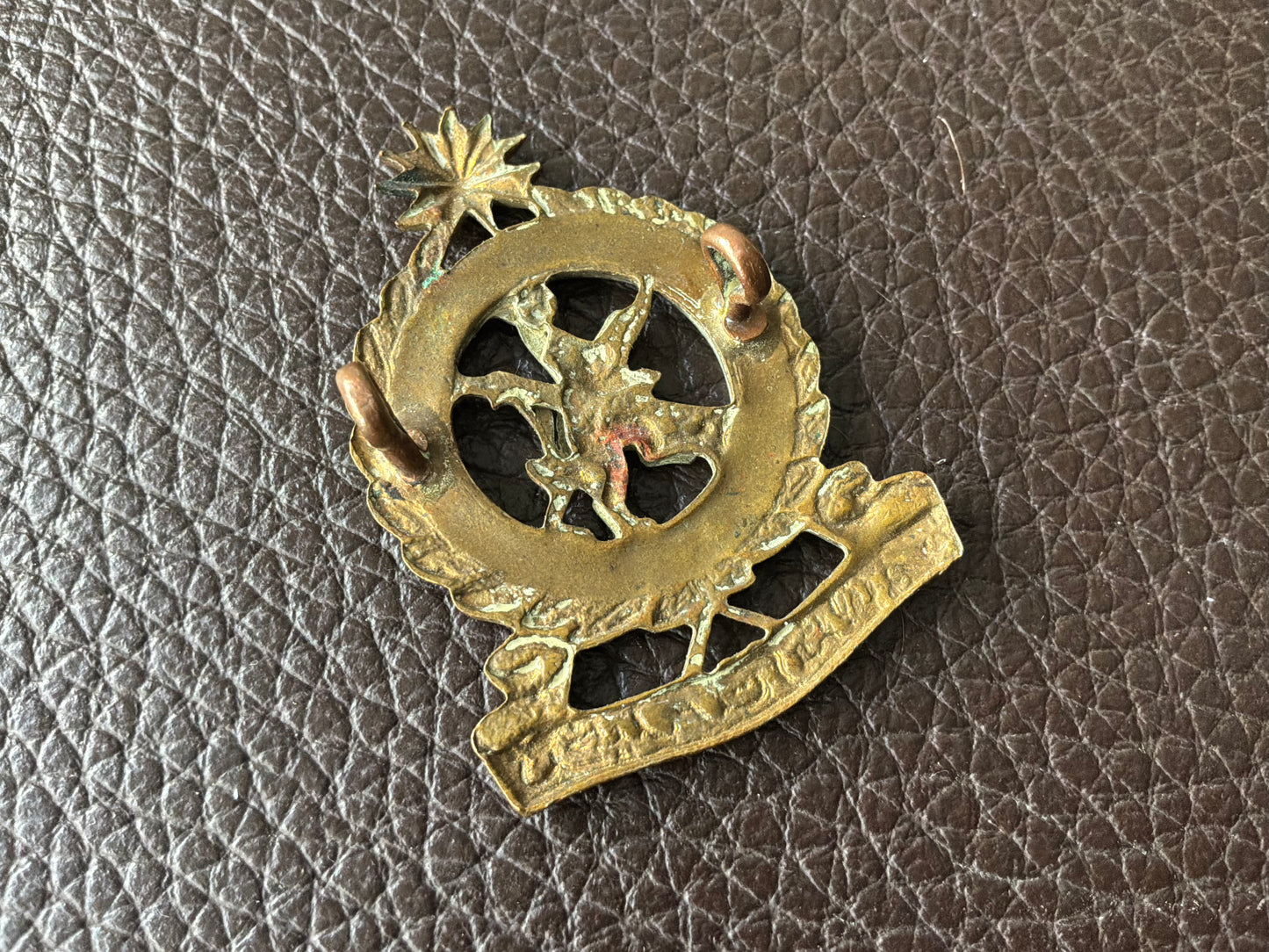 Federated Malay Armed Forces Maintenance Corps (A.F.M.C) cap badge.