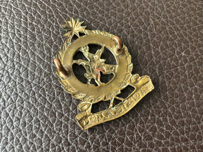 Federated Malay Armed Forces Maintenance Corps (A.F.M.C) cap badge.