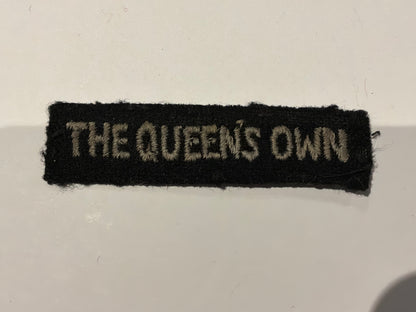 THE QUEENS OWN (565 (Mixed) Light Anti-Aircraft/Searchlight Regiment (Surrey) cloth title.