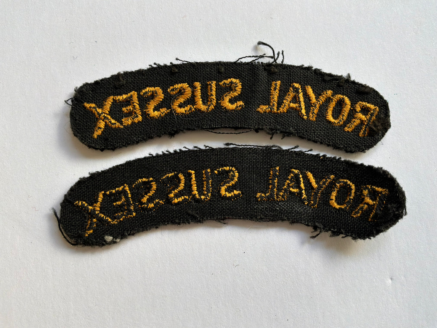 Post WW2 ROYAL SUSSEX Regt cloth shoulder titles.
