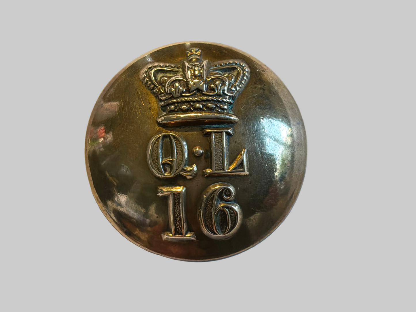 Q.V.C 16th The Queens Lancers large 25mm button by rare maker, worn circa 1861-1902.