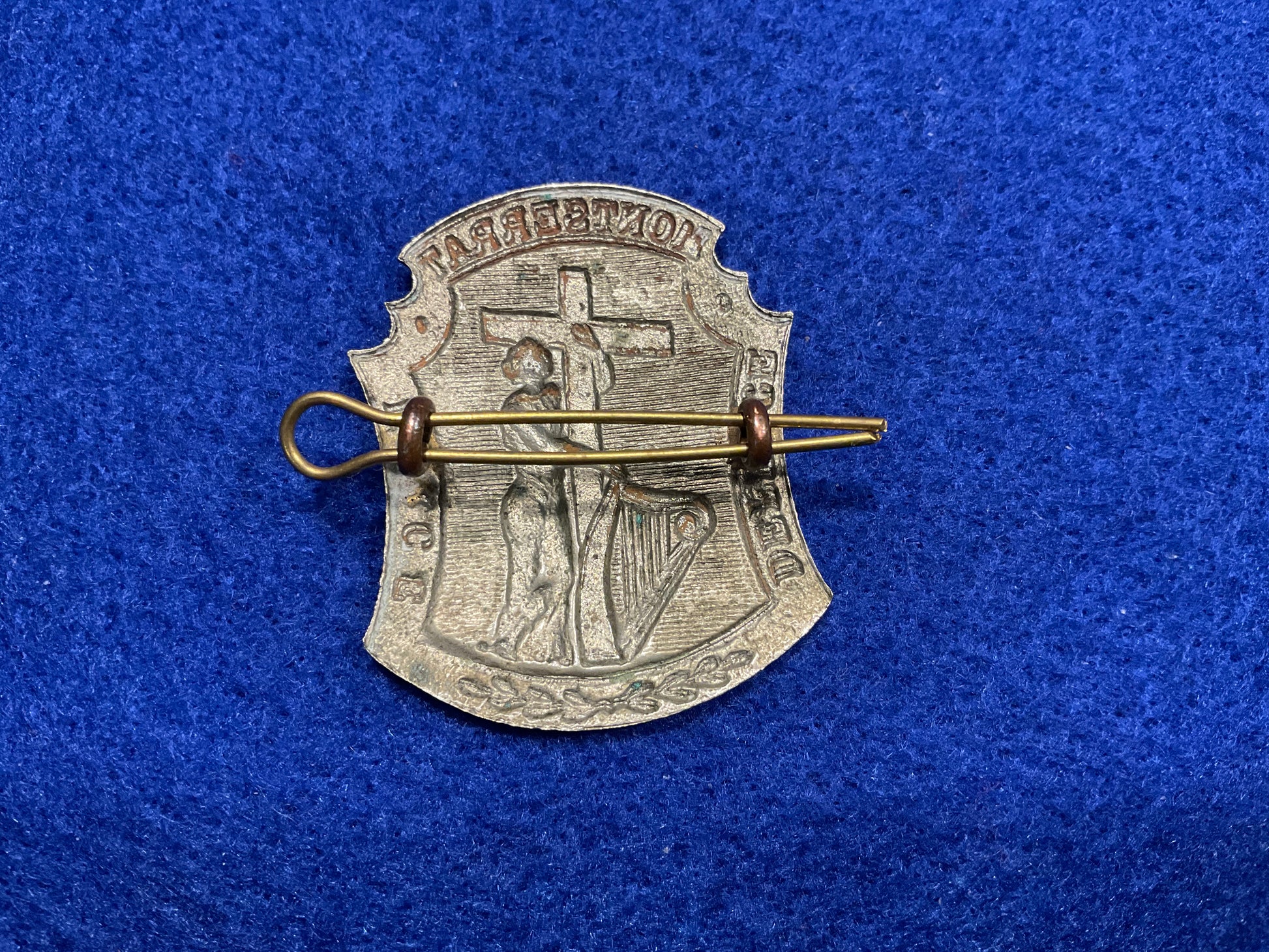 Montserrat Defence Force cap badge