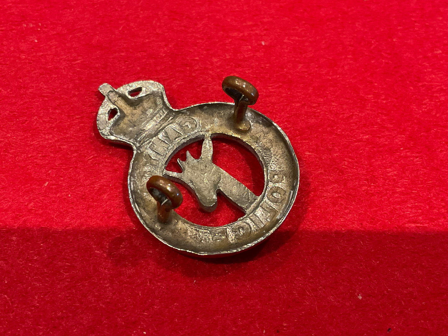 Pre 1952 K/C Tanganyika Police w/m cap badge