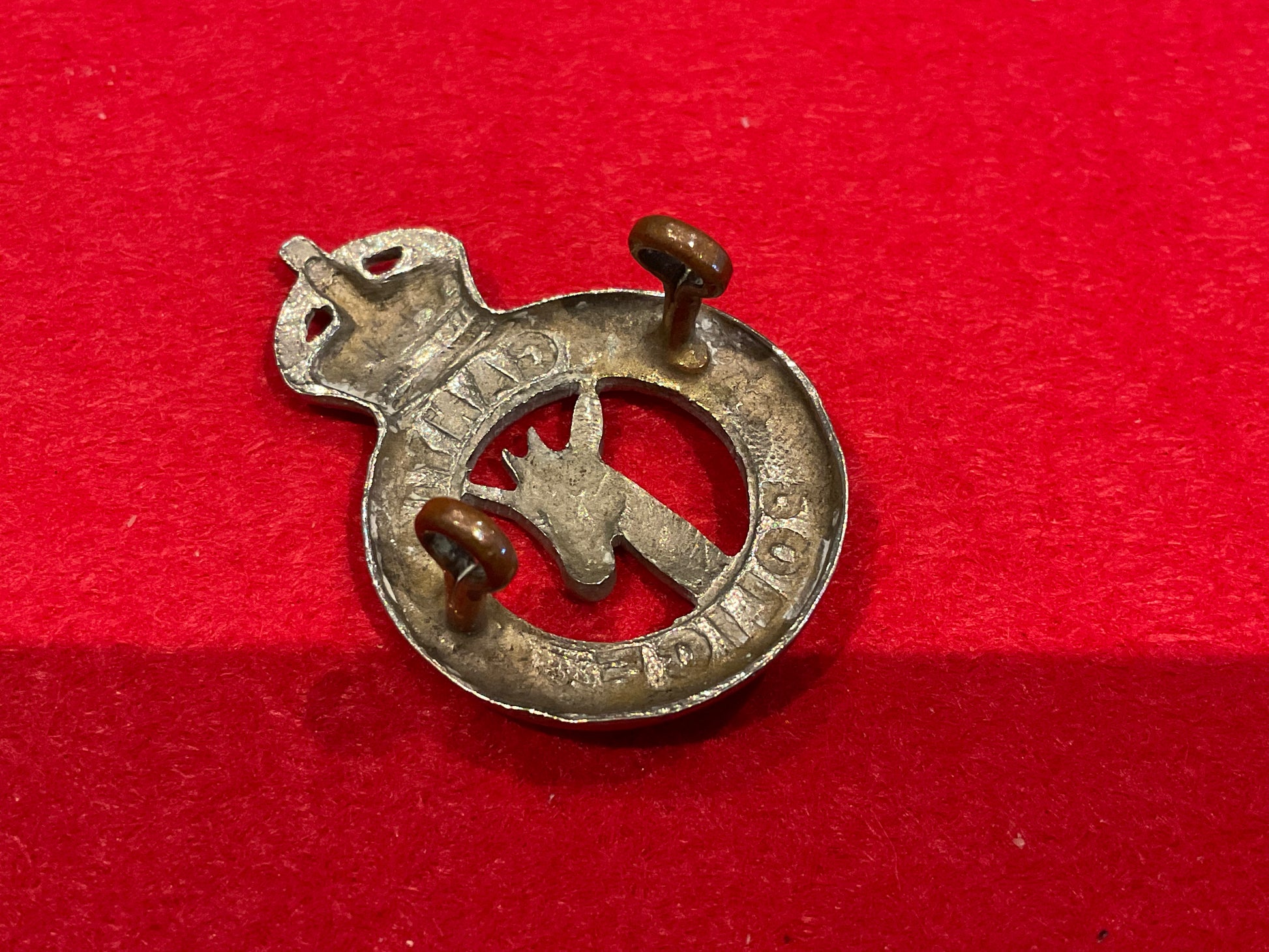Pre 1952 K/C Tanganyika Police w/m cap badge