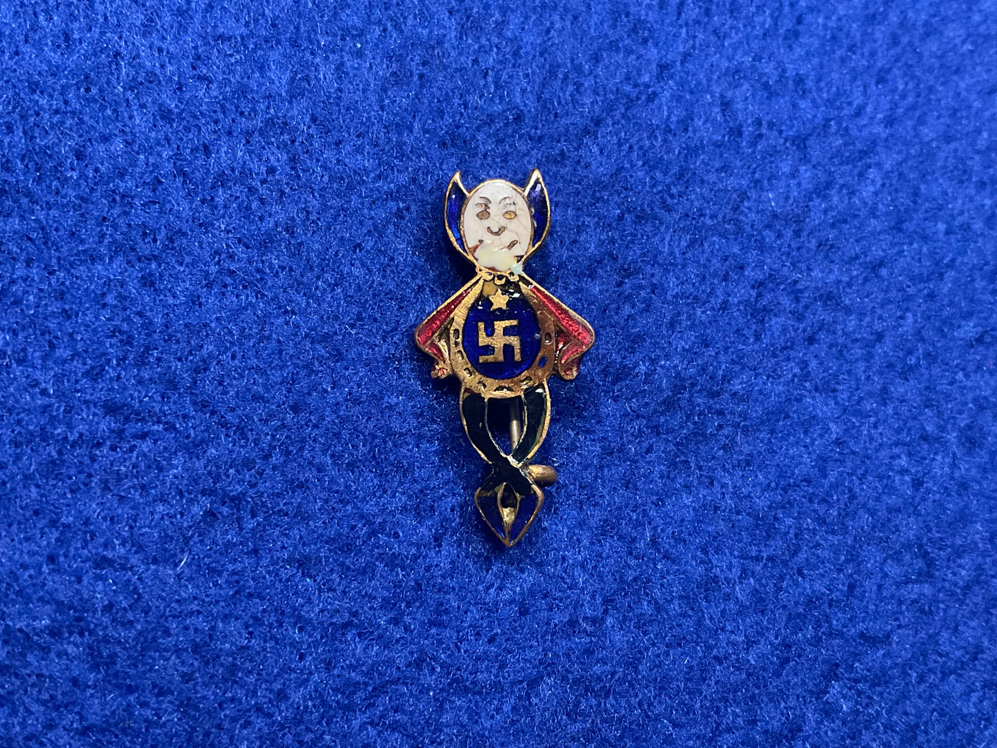 Victorian/Edwardian ‘Lucky Devil’ or ‘Lucky Imp’ enamel swastika badge