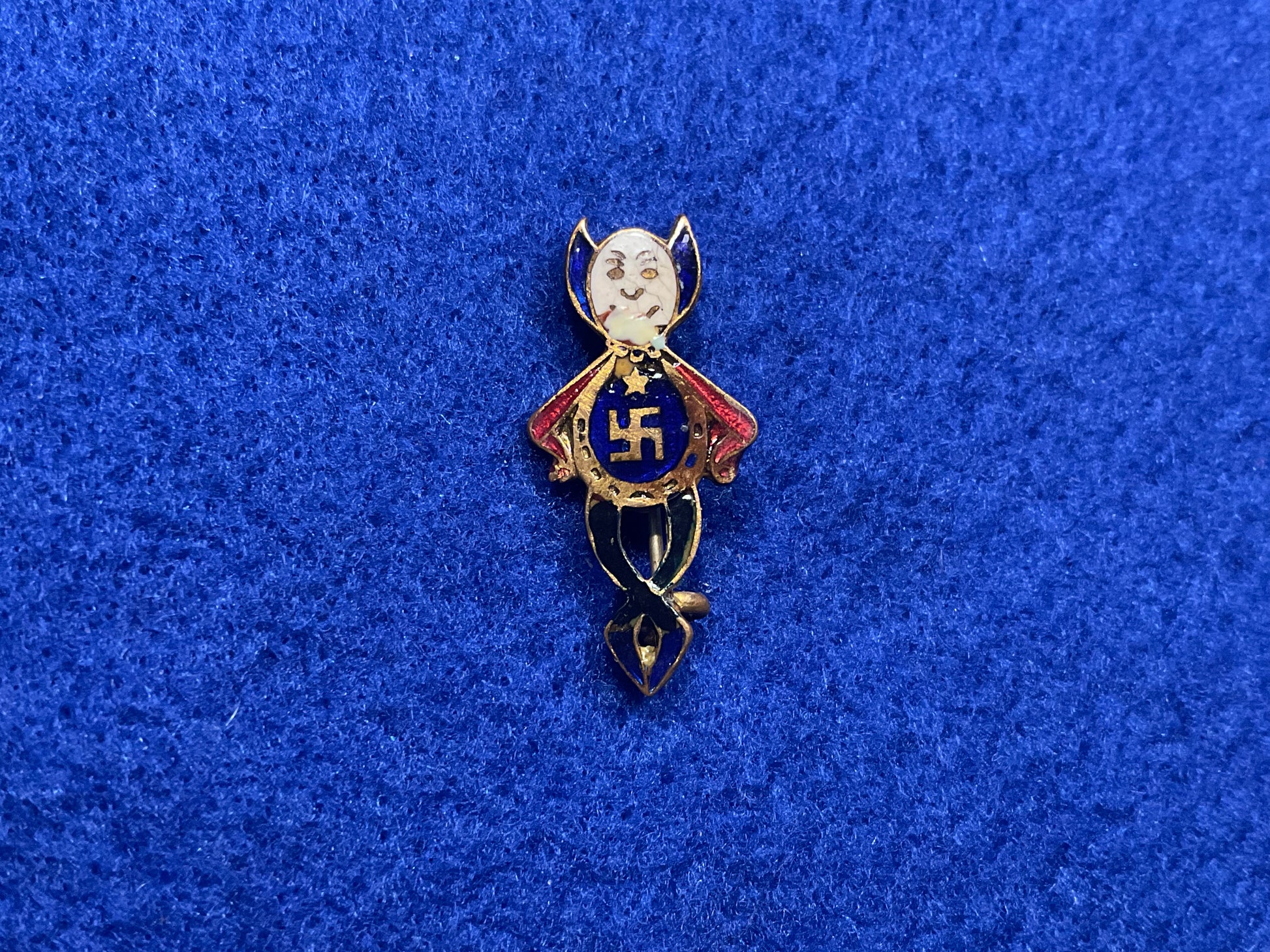 Victorian/Edwardian ‘Lucky Devil’ or ‘Lucky Imp’ enamel swastika badge