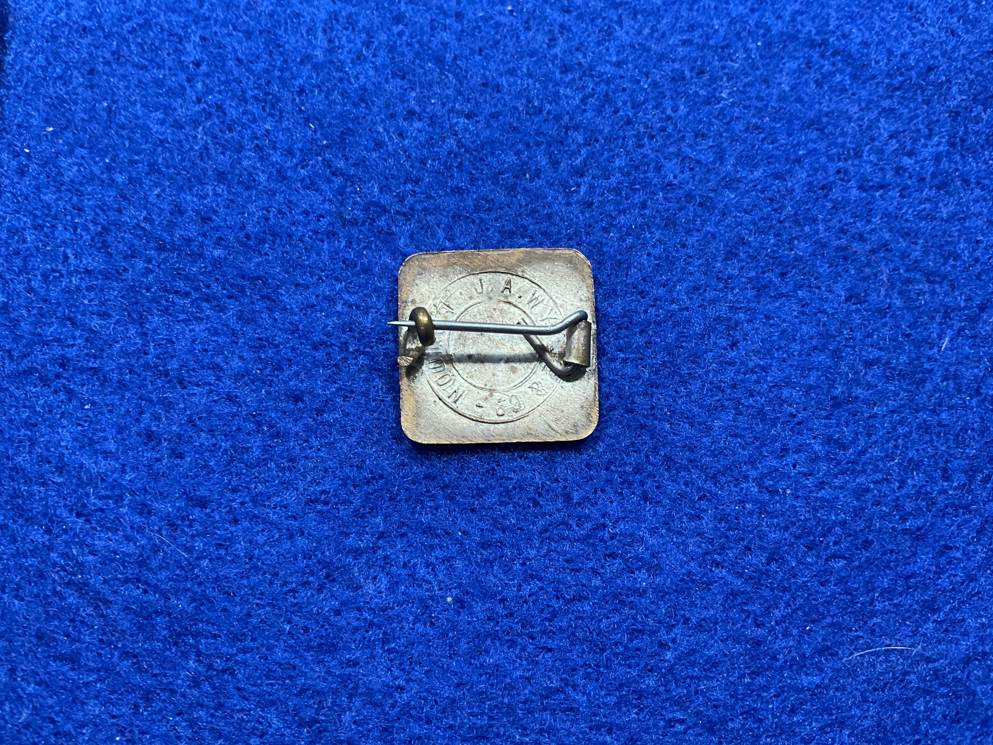 WW1 National War Savings Committee (swastika design) badge circa 1914-15