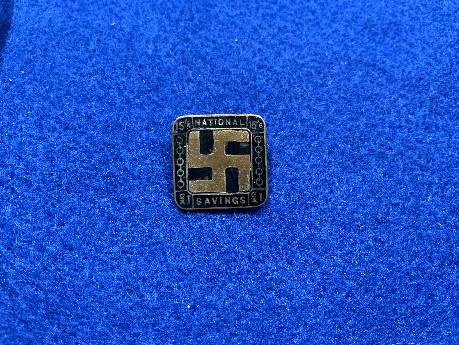 WW1 National War Savings Committee (swastika design) badge circa 1914-15