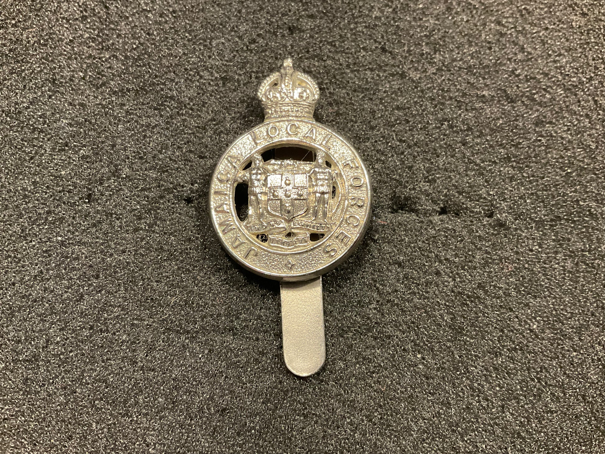 White metal Jamaica Local Forces cap badge by Firmin