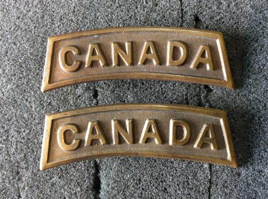 1916 dated matching CANADA Shoulder titles by CARON
