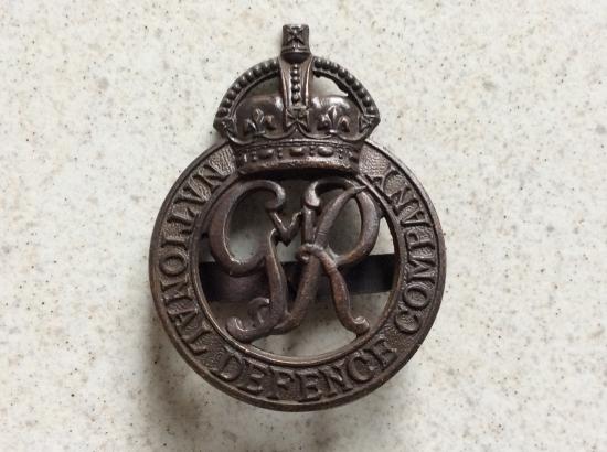 National Defence Company O.S.D cap badge