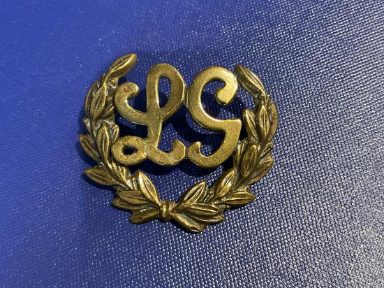 WW1 L.G (Lewis Gunners) brass sleeve badge