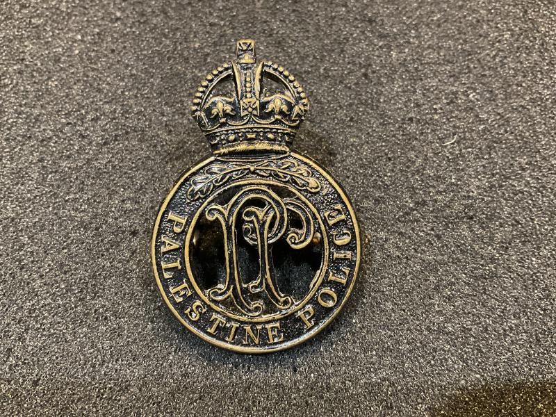 Palestine police blackened brass cap badge