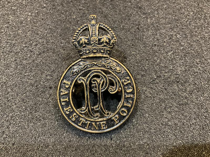 Palestine police blackened brass cap badge