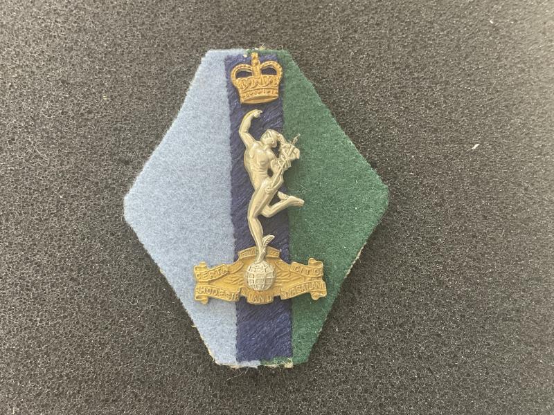 Rhodesia & Nyasaland Signals Regt cap badge and backing