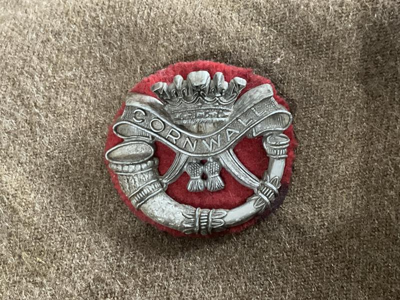 WW2 Economy plastic D.C.L.I cap badge.