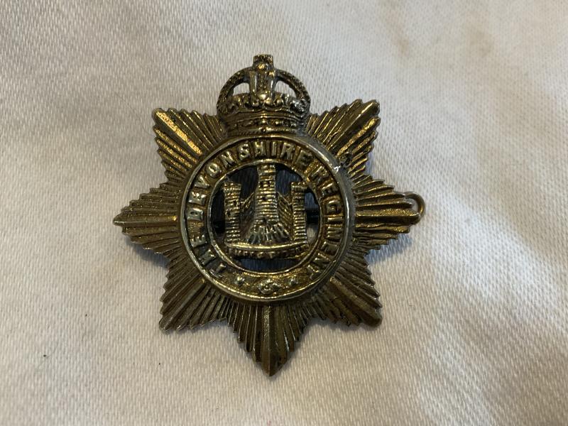 WW2 Theatre made The Devonshire Regiment cap badge