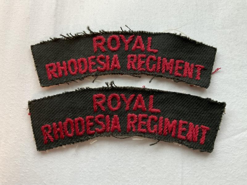 Royal Rhodesia Regiment cloth shoulder titles.