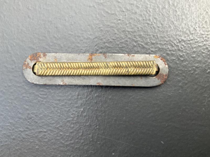 WW1/2 Brass wound stripe on metal backing plate.
