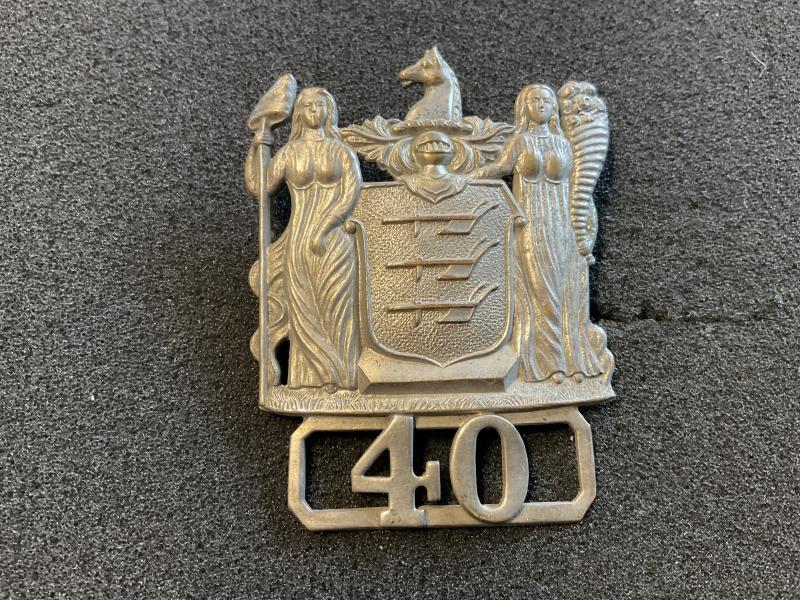 New Jersey Police Department Officer number 40 cap badge.