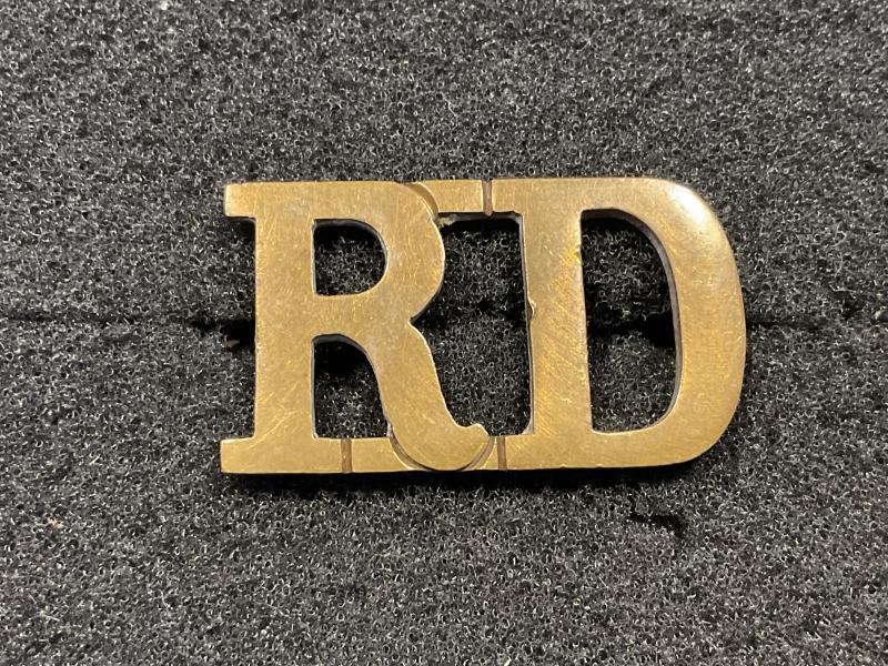 Pre 1913 ‘R.D’ Royal Dragoons brass shoulder title.