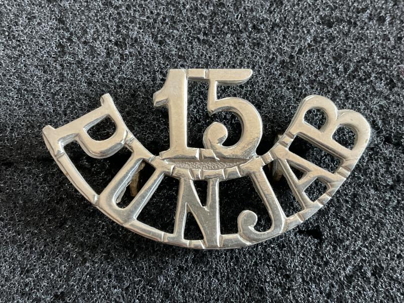 15th Punjab Regiment white metal shoulder title.